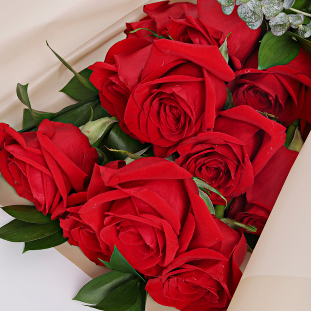 Bouquet de 12 rosas rojas/rosadas